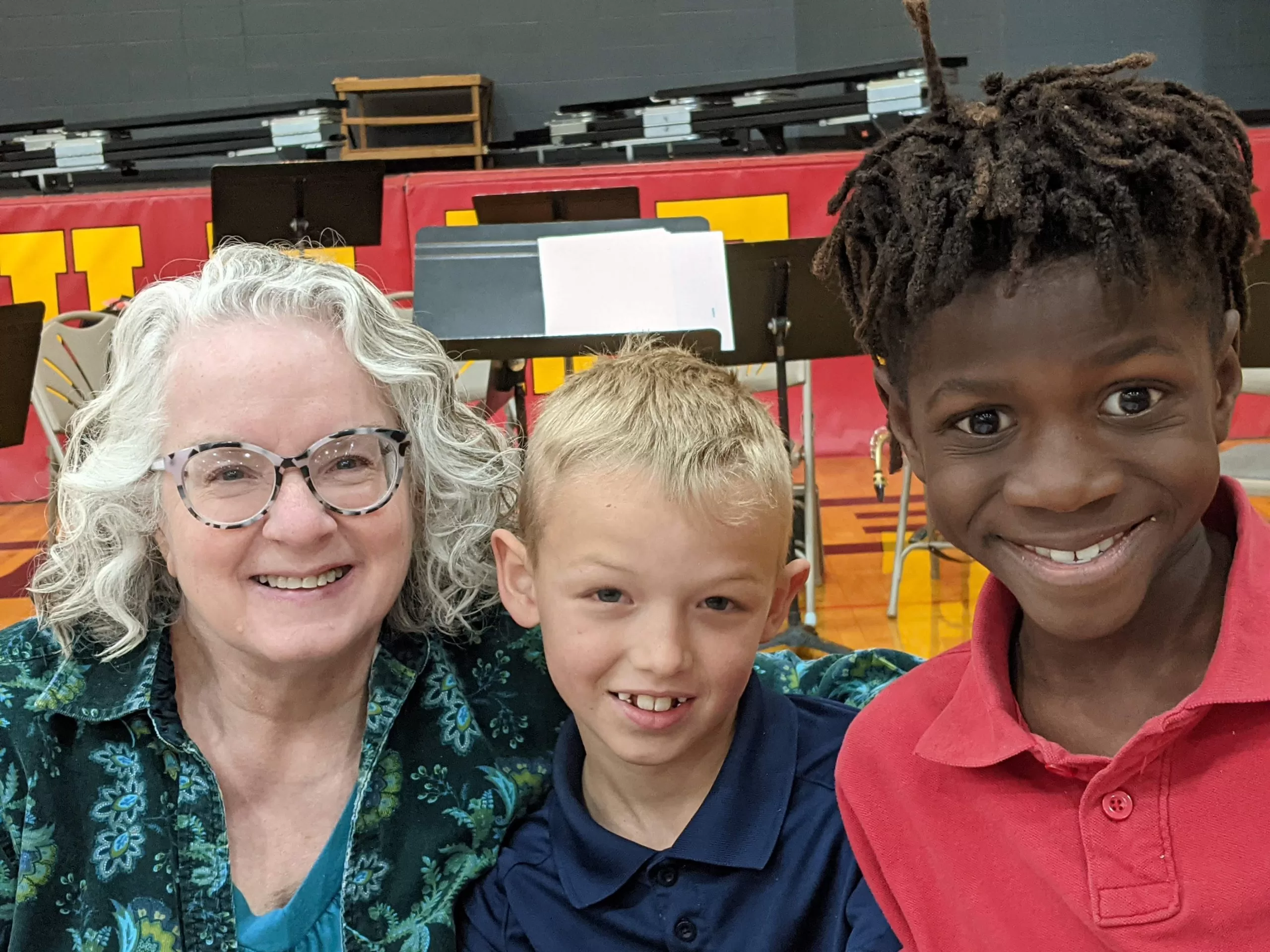Grandparent and Two Students